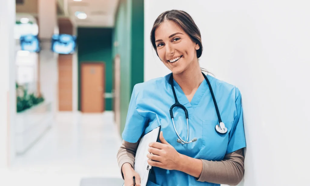 Registered nurse in Australia preparing patient report with a stethoscope